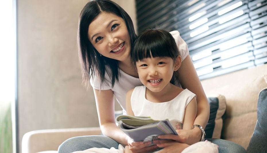 woman with child reading