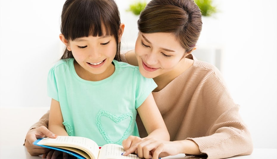 girl and mother reading