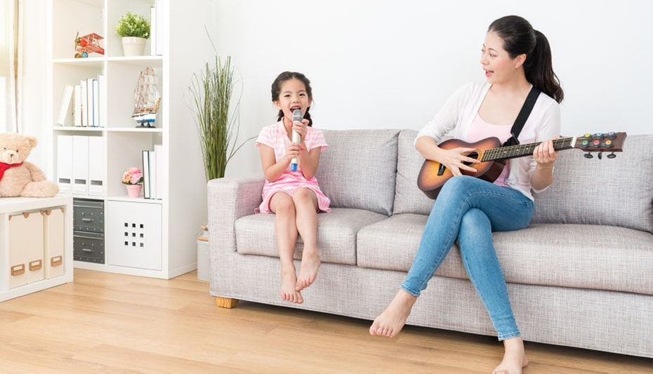 girl and mother making music